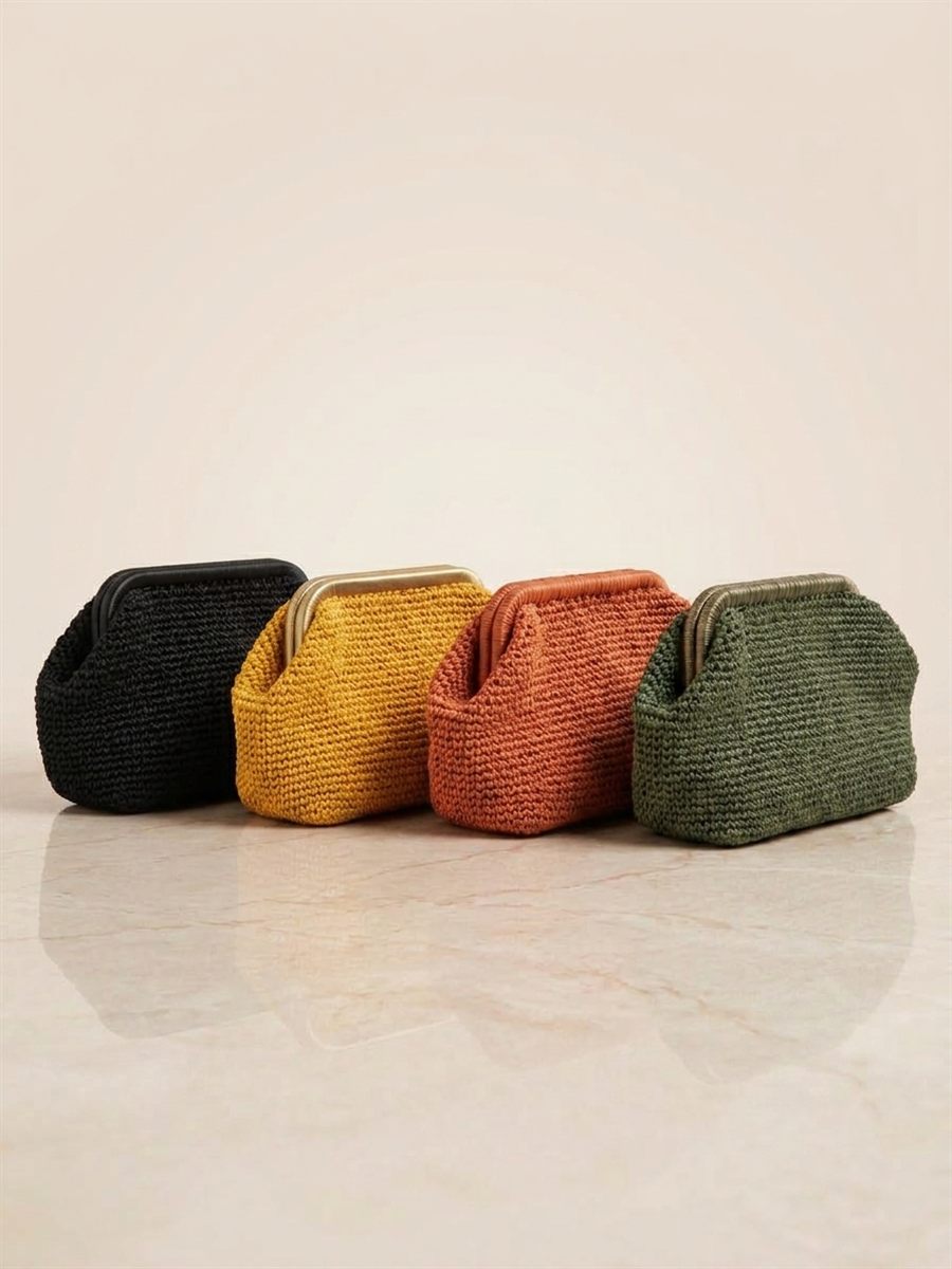 Handwoven paper yarn clutch bags in black, mustard, terracotta and olive